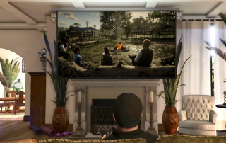 A GTAV character watches a TV displaying a group of RDR2 characters sitting around a campfire.